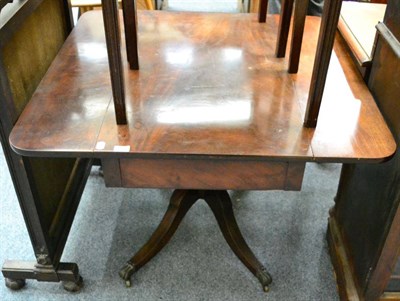 Lot 1449 - A Georgian mahogany pedestal supper table