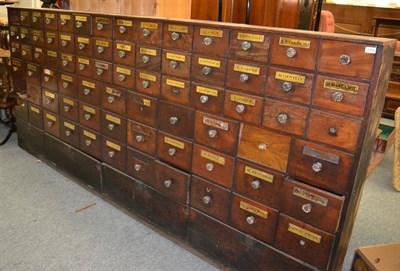 Lot 1452 - A Victorian mahogany chemist's drug cabinet, comprising seventy five drawers above four...