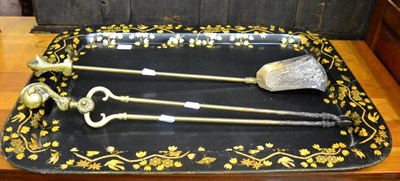 Lot 1458 - A 19th century papier mache tray and a pair of fire irons