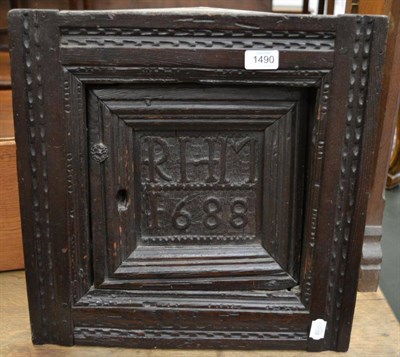 Lot 1490 - An oak small wall cupboard, the door carved 'RHM 1688'