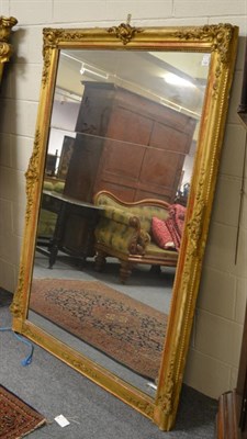 Lot 1493 - A Victorian gilt and gesso over mantel mirror, 130cm wide