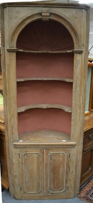 Lot 1501 - An early 19th century pine corner cupboard with painted interior