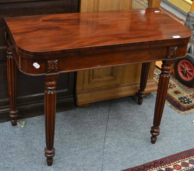 Lot 1503 - A William IV fold over mahogany tea table