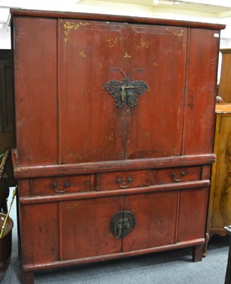 Lot 1508 - A Chinese soft wood lacquered cabinet