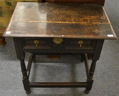 Lot 1521 - An early 18th century oak side table