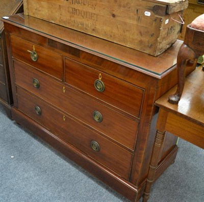 Lot 1543 - A late George III mahogany four drawer straight fronted chest