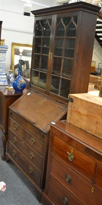 Lot 1545 - An 18th century bureau bookcase