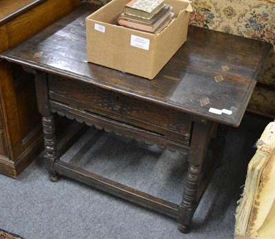 Lot 1573 - An early 18th century oak single drawer low table