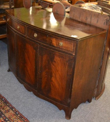 Lot 1586 - A Regency mahogany bow fronted sideboard