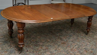 Lot 1607 - A mahogany D-end wind-out table