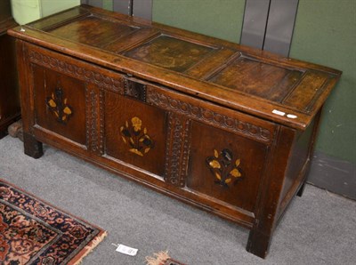 Lot 1617 - ^A 17th century oak coffer with later inlaid floral panels