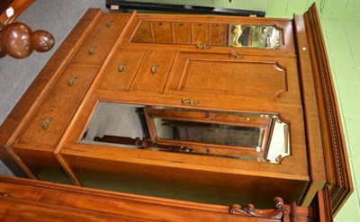 Lot 1620 - An Edwardian oak and burr wood wardrobe bearing the label Teale & Son, Leeds