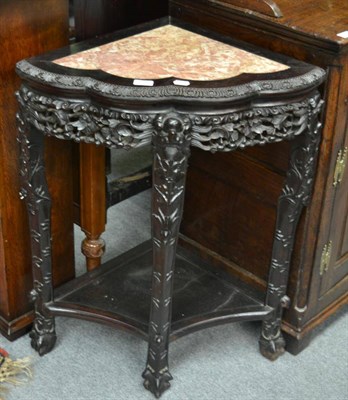 Lot 1636 - Chinese pink marble and padouk corner table