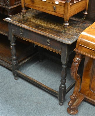 Lot 1651 - An 18th century oak single drawer side table