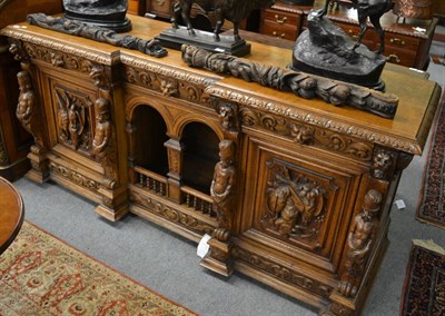 Lot 1656 - A large 19th century Renaissance revival oak sideboard, with arcaded central section flanked by...