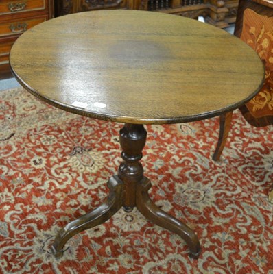 Lot 1662 - ^A George III oak tripod table, refinished