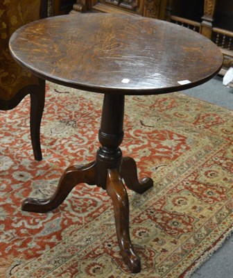 Lot 1664 - #George III oak tilt top tripod table