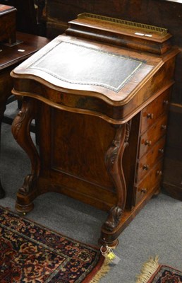 Lot 1665 - A Victorian walnut davenport