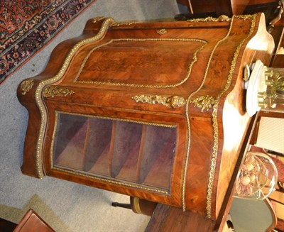 Lot 1667 - Victorian figured and burr walnut serpentine shaped credenza with gilt metal mounts