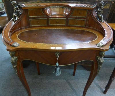 Lot 1669 - A late 19th century mahogany French style Bonheur du Jour