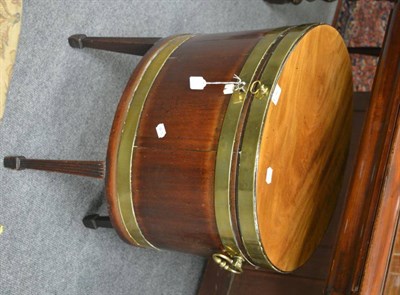 Lot 1674 - A George III mahogany oval wine cooler, with brass banding on tapered and reeded legs,...