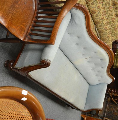 Lot 1683 - A Victorian mahogany settee with an upholstered backrest with waved top rail, upholstered arms...