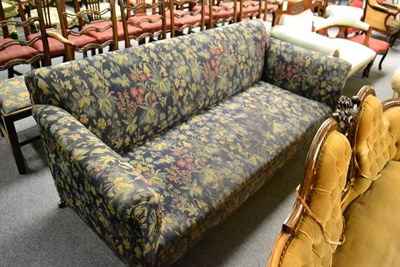 Lot 1695 - A three seater sofa, close covered in tapestry weave