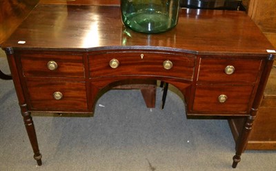 Lot 1711 - ^A late regency mahogany and ebony strung dressing table, with reeded edge above an arrangement...