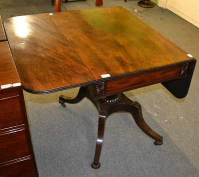 Lot 1712 - A Regency mahogany rounded rectangular drop leaf table