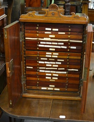 Lot 1721 - A mahogany collectors cabinet, with key