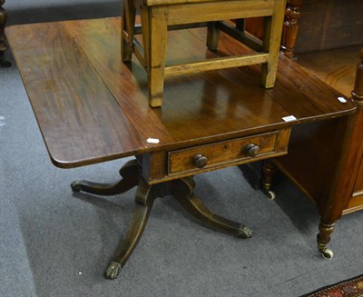 Lot 1725 - A Georgian mahogany pedestal supper table