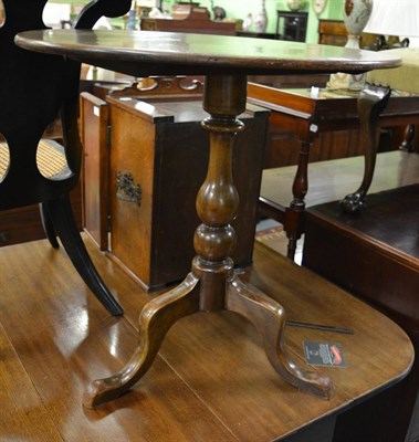 Lot 1732 - ^A George III mahogany oval tilt top table, early 19th century