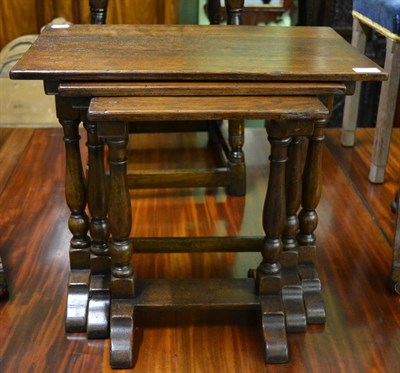 Lot 1739 - An oak nest of three graduated tables