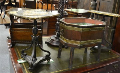 Lot 1744 - A pair of ebonised and parcel gilt Regency pedestal tables