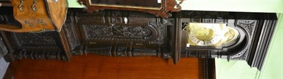 Lot 1750 - A carved oak chiming longcase clock, circa 1880, the elaborately carved case with scroll and floral