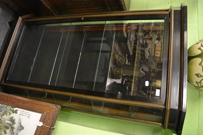 Lot 1763 - Ebonised and gilt metal display cabinet