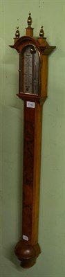 Lot 1766 - A reproduction stick barometer, Comitti, Holborn, circa 1973, turned finials, concealed mercury...