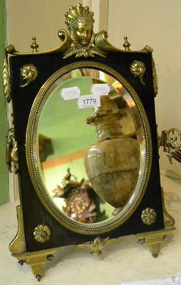 Lot 1779 - An ebonised and brass mounted easel mirror