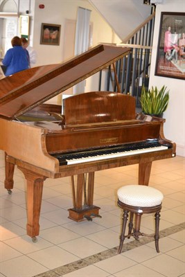 Lot 1801 - A walnut cased baby grand piano, George Rogers & Sons, London and music seat