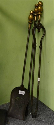 Lot 1806 - A set of three 19th century steel and brass fire tools