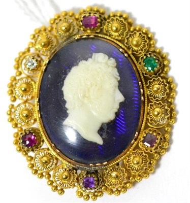 Lot 6 - A cameo 'Regard' brooch, a white glass cameo depicting the portrait of a gentleman on an iridescent