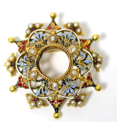Lot 24 - An enamel, seed pearl and garnet set brooch, a vacant circular centre within a border of six...
