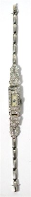 Lot 42 - A lady's diamond set wristwatch, circa 1930, lever movement, silvered dial with Arabic...