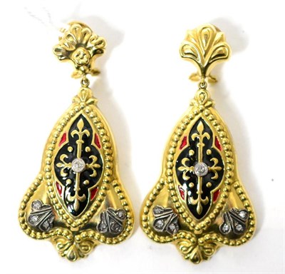 Lot 56 - A pair of diamond and enamel drop earrings, trefoil studs suspend fancy pendant drops, each set...