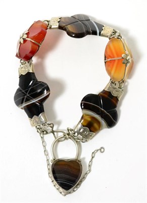 Lot 57 - A Scottish style bracelet, rosette and cross shaped banded agate links with white mounts, with...