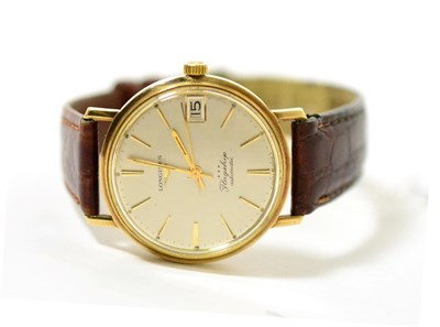 Lot 62 - A 9ct gold automatic calendar centre seconds wristwatch, signed Longines, Flagship, 1965,...