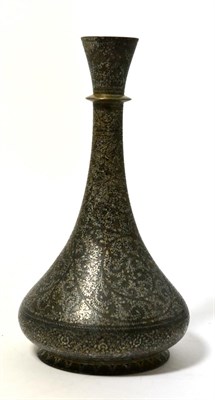 Lot 94 - A Persian silver inlaid pear shaped vase, 24cm high
