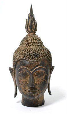 Lot 95 - A Chinese bronze Buddha head, probably 17th century, 28.5cm high