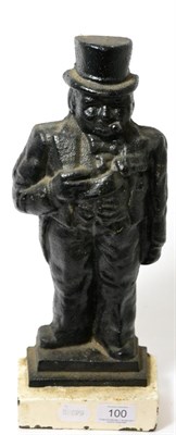 Lot 100 - A painted cast iron door stop, modelled as Winston Churchill standing wearing a top hat and smoking