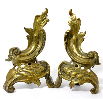 Lot 103 - A pair of brass chenet, cast with scrolling foliage, 19cm high